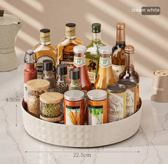 Efficient kitchen storage with multi-function rotating box.